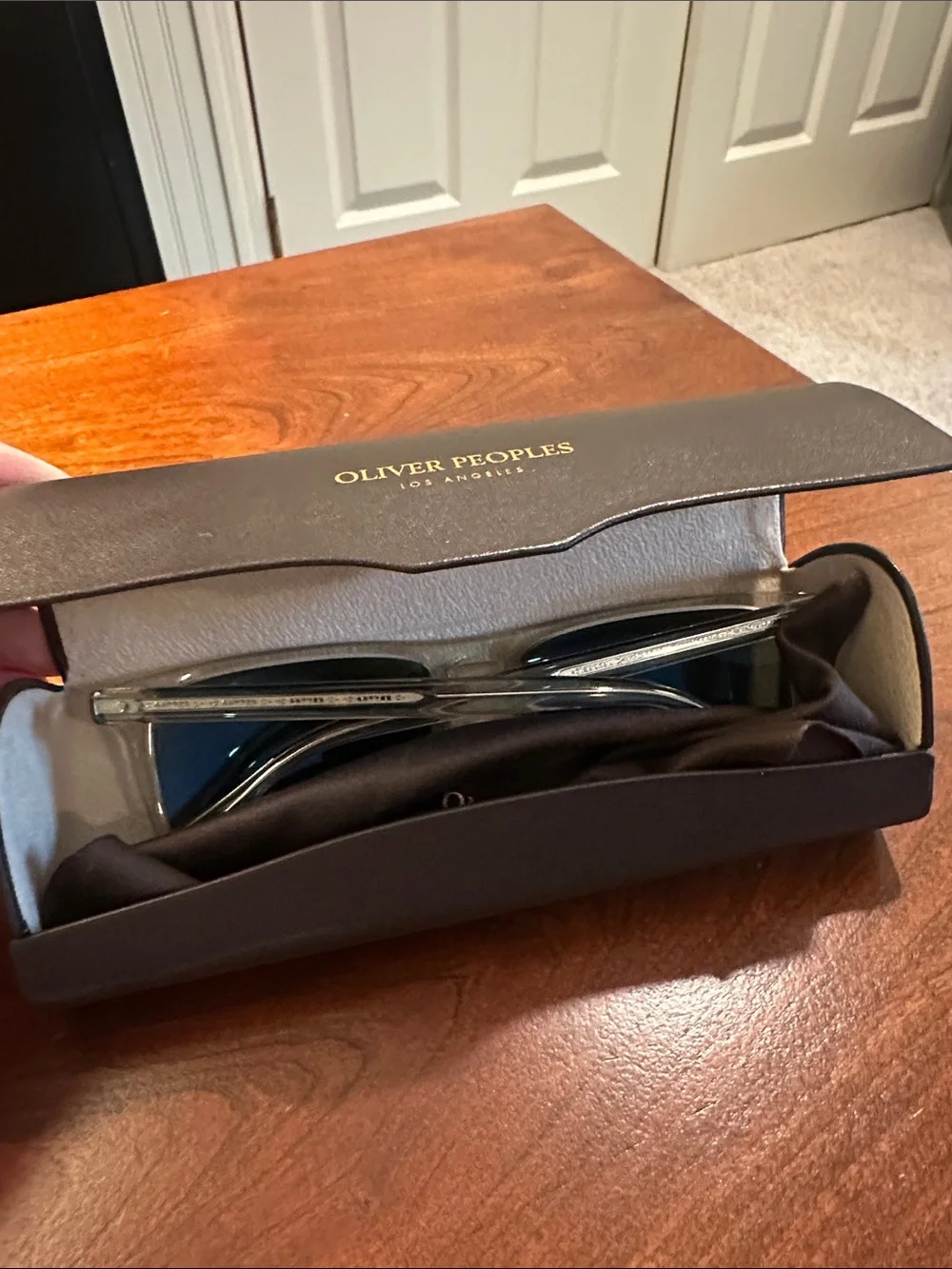 Oliver Peoples Clear Frame Sunglasses with Brown Lenses